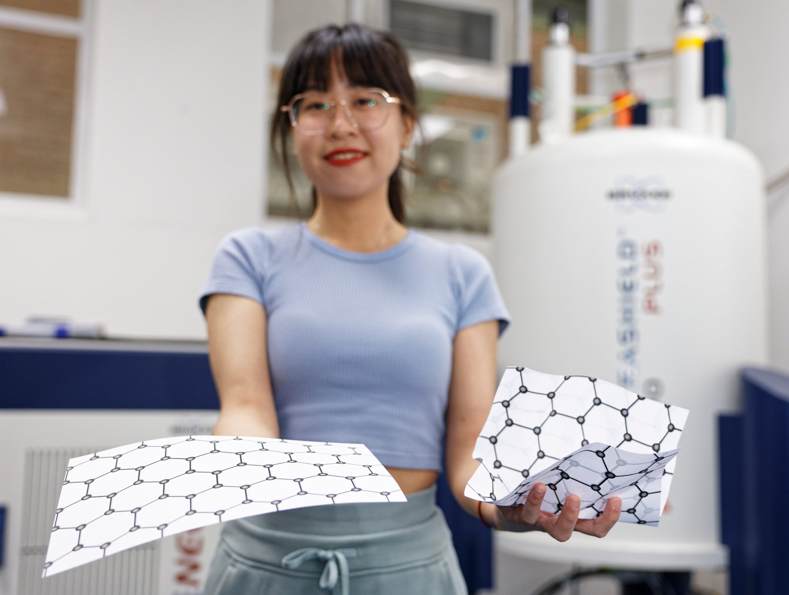 Xinyu-Liu-With-Models-of-Graphene-and-a-Disordered-Carbon-Electrode-scaled.jpg